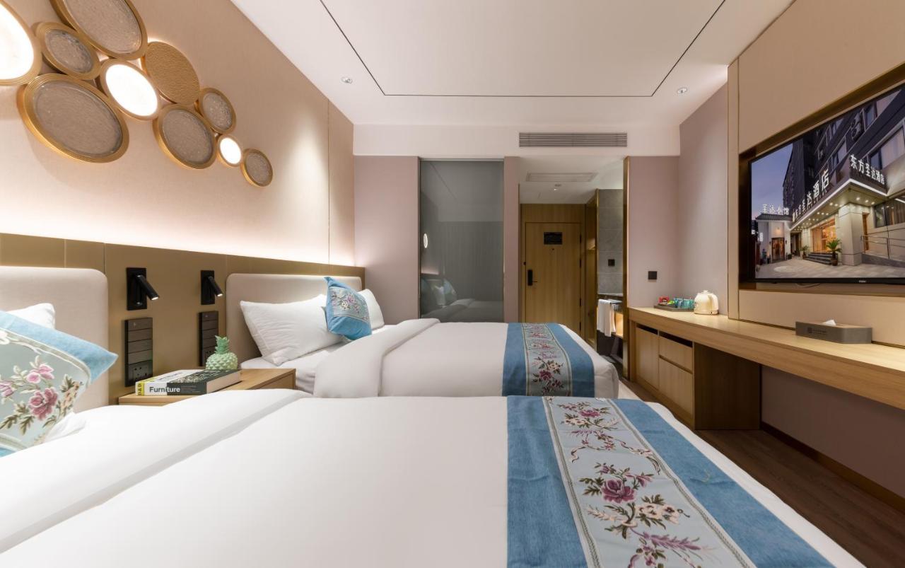 East Sacred Hotel--Very Near Beijing Tiananmen Square ,The Forbidden City,The Temple Of Heaven ,3 Minutes' Walk To Wangfujing Subway ,Located In The Center Of Beijing, Many Shopping Malls Around,Newly Renovated Hotel-Able To Receive Foreign Guests ภายนอก รูปภาพ Deluxe Room